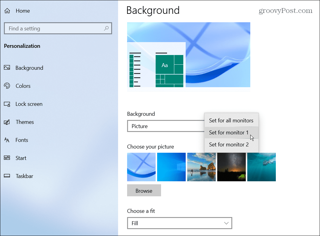 如何在 Windows 上设置双显示器的不同壁纸？