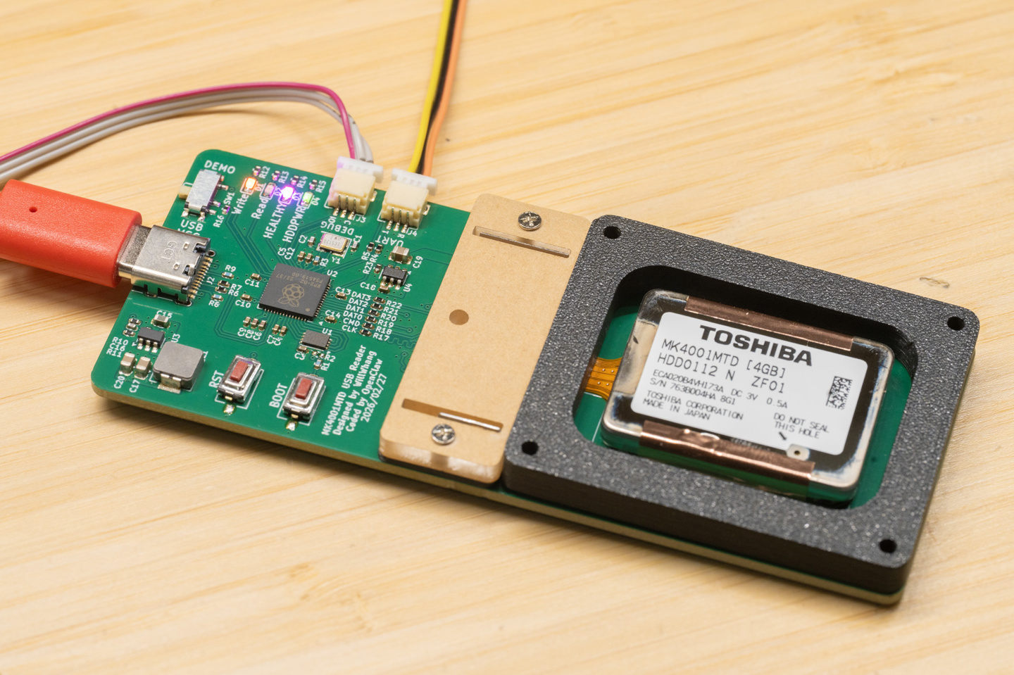 网友借助“小龙虾”AI 解码，在诺基亚 N91 手机上成功逆向工程全球最小机械硬盘